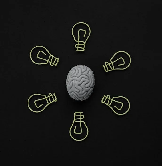 Discover 7 Powerful Exercise Benefits for Mental Health 10 illustration of a brain with lightbulbs surrounding the brain