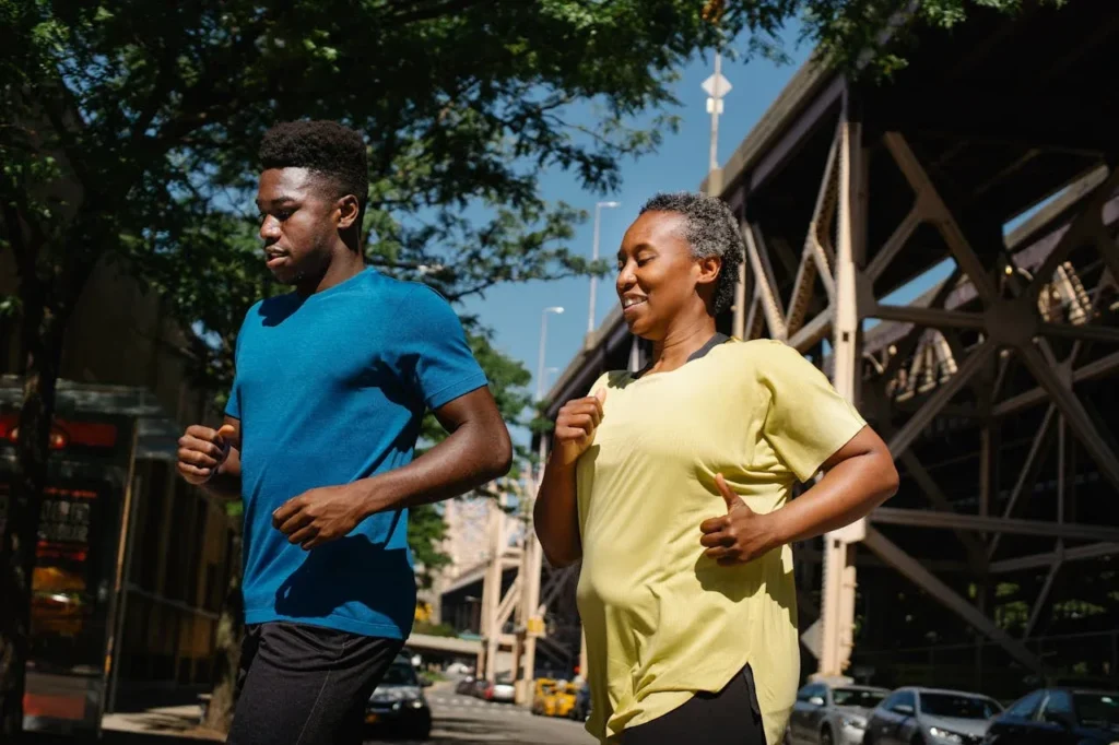 Starting Exercise at 40: 7 Essential Tips To Revolutionize Your Life 5 mom and son jogging in the city