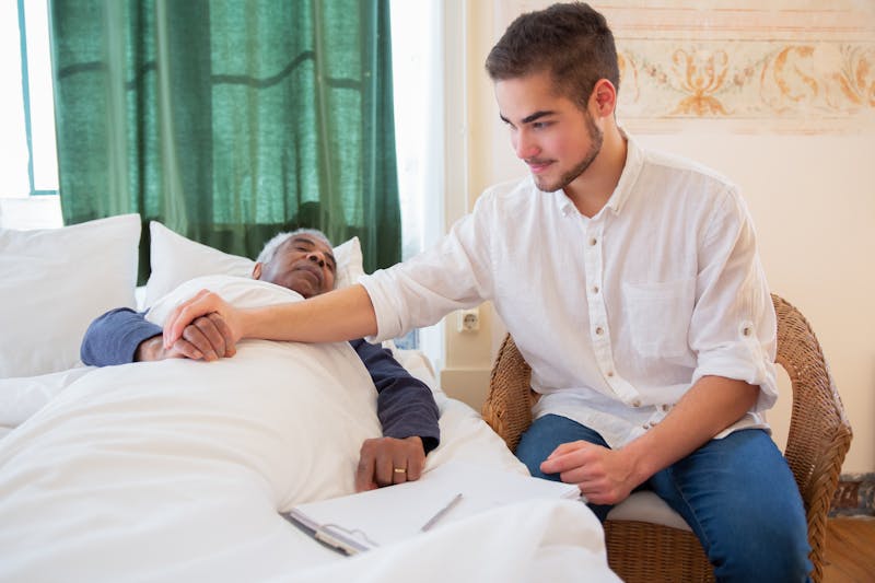 What is Strength: 6 Essential Elements 4 a young man comforting another man