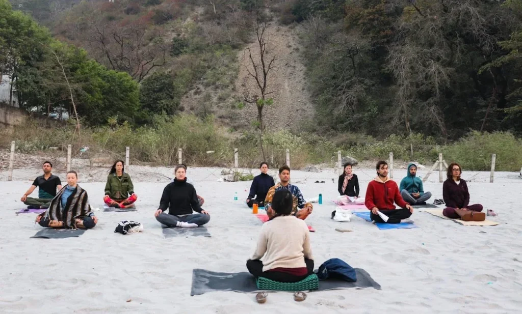 Starting Exercise at 40: 7 Essential Tips To Revolutionize Your Life 7 group meditation on a white sand beach
