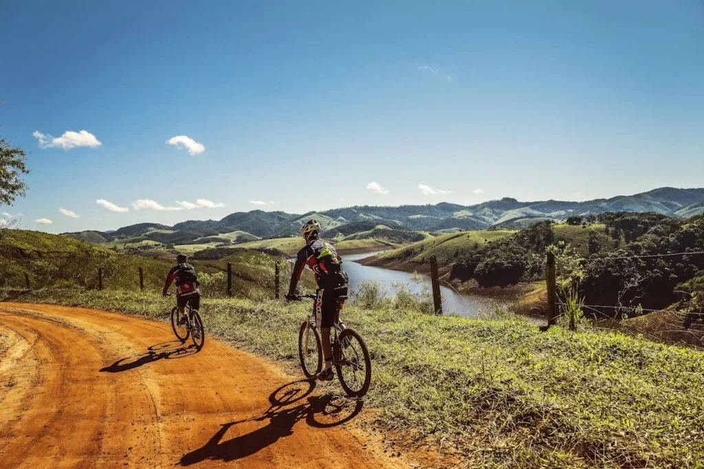 Rapid Fat Loss: 7 Powerful Fitness Hacks 7 two people riding bicycles down a picturesque dirt road