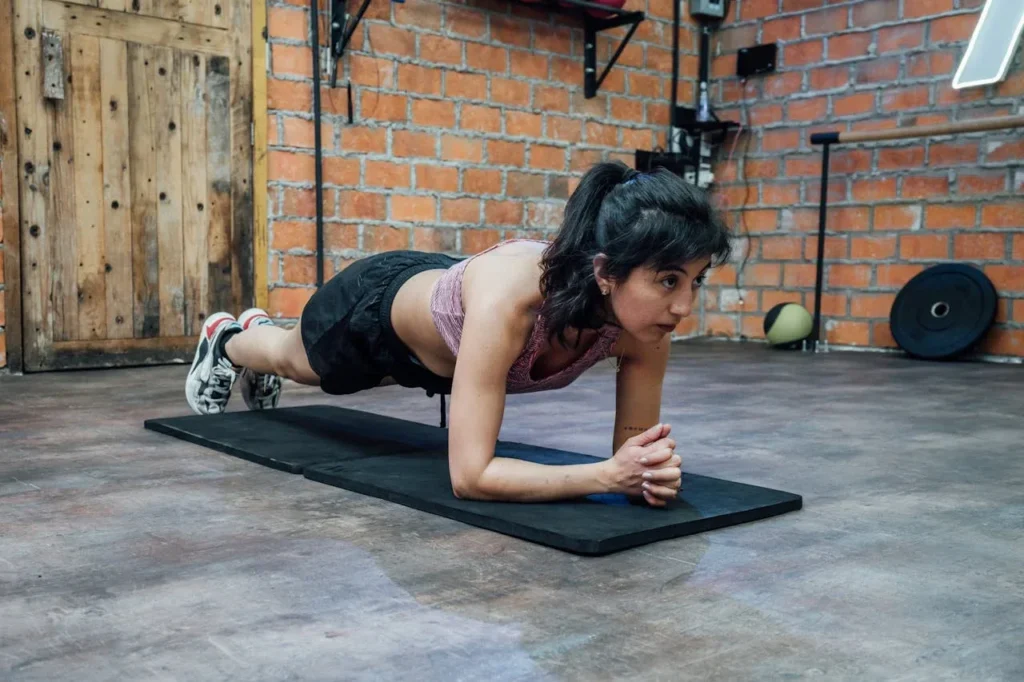 Functional Fitness for Everyday Life: 5 Essential Moves to Supercharge Your Health 4 woman doing plank position correctly