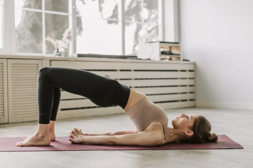 Bodyweight Exercises: 7 Incredible Workouts to Transform Your Fitness 10 girl doing glute bridge
