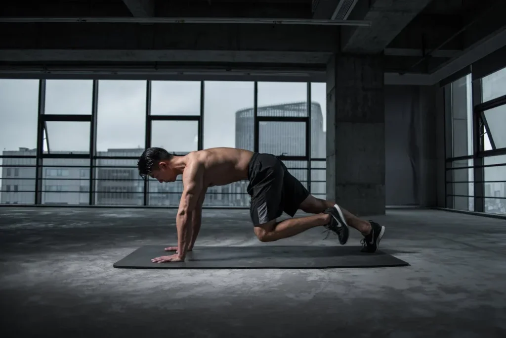Bodyweight Exercises: 7 Incredible Workouts to Transform Your Fitness 9 man doing mountain climbers