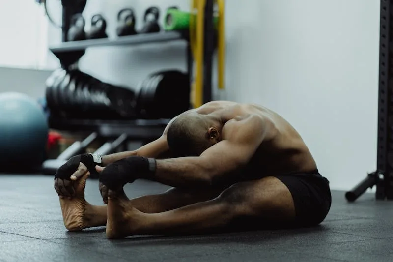 man demonstrating cool down stretch