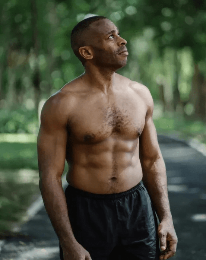 Calisthenics for Seniors: 7 Powerful Exercises to Boost Strength and Vitality 3 muscular older man appearing contemplative in a park