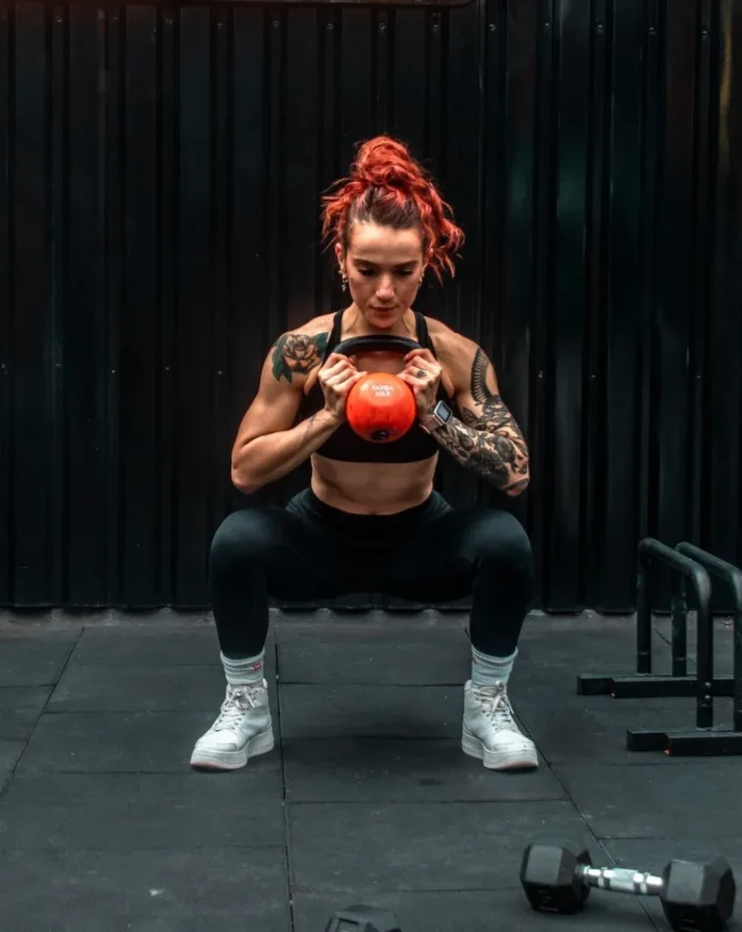 Minimalist Strength Training: 7 Proven Techniques for Great Results 4 girl kettlebell squat