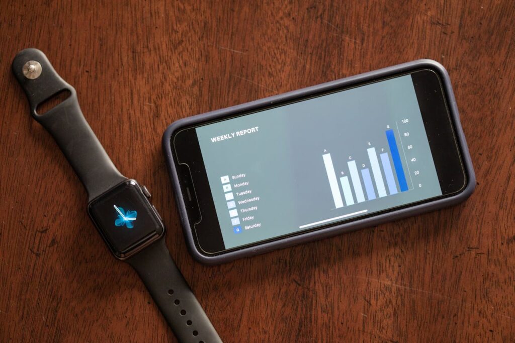 How to Master Bodyweight Training: 7 Steps to Achieve Incredible Strength and Endurance 6 a tracker next to a fitness app