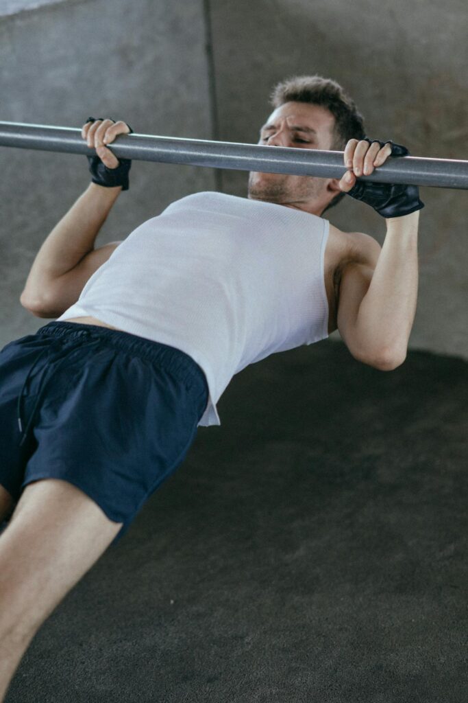 Beginner Calisthenics: 5 Powerful Moves to Build Strength Fast! 3 man performing a good form horizontal row