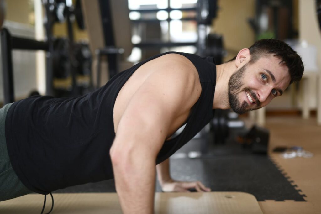 Beginner Calisthenics: 5 Powerful Moves to Build Strength Fast! 2 beginner calisthenics with man smiling while doing pushups