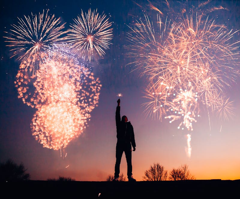 How to Master Bodyweight Training: 7 Steps to Achieve Incredible Strength and Endurance 8 Man celebrating his accomplishments with fireworks