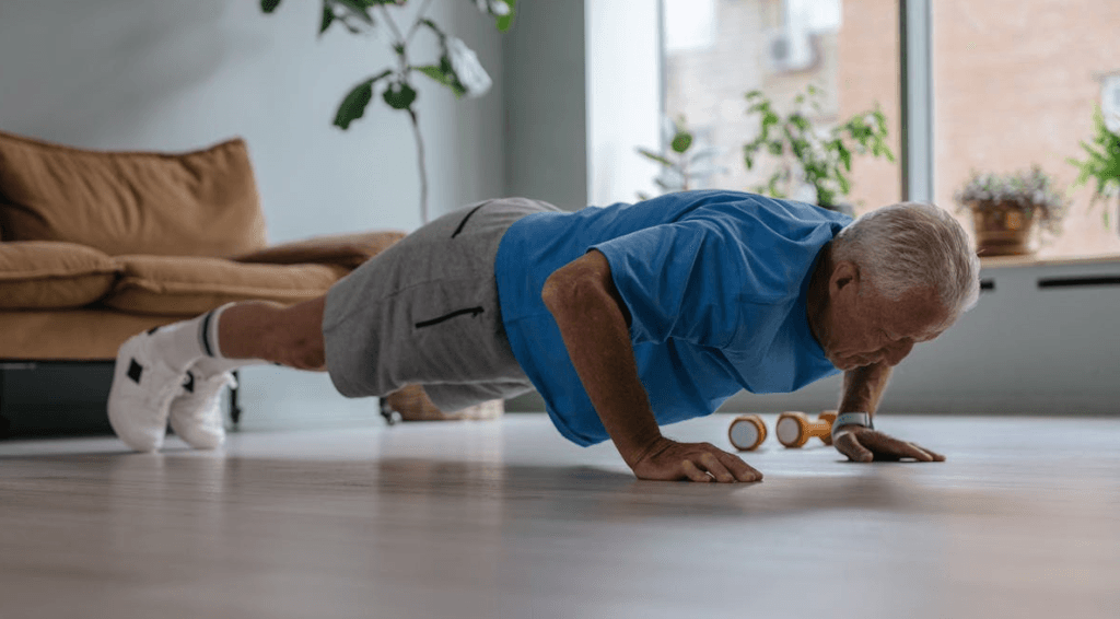 Get Strong, Stay Strong: Senior Workouts Without Equipment 5 senior man doing pushups with very good form