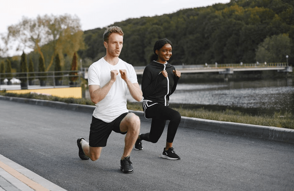 7 Powerful Leg Exercises Without Weights for Ultimate Strength 5 a couple doing lunges on a walking track