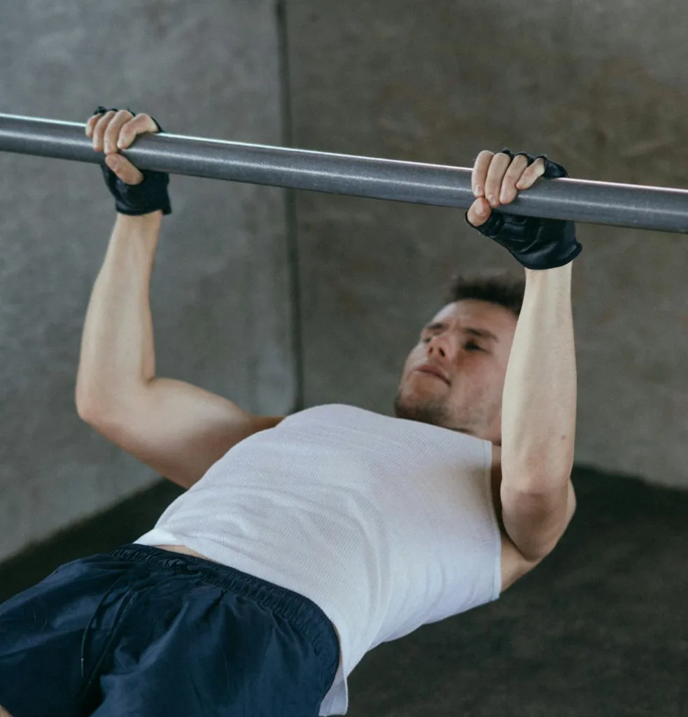 man performing australian pull ups otherwise known as bar rows