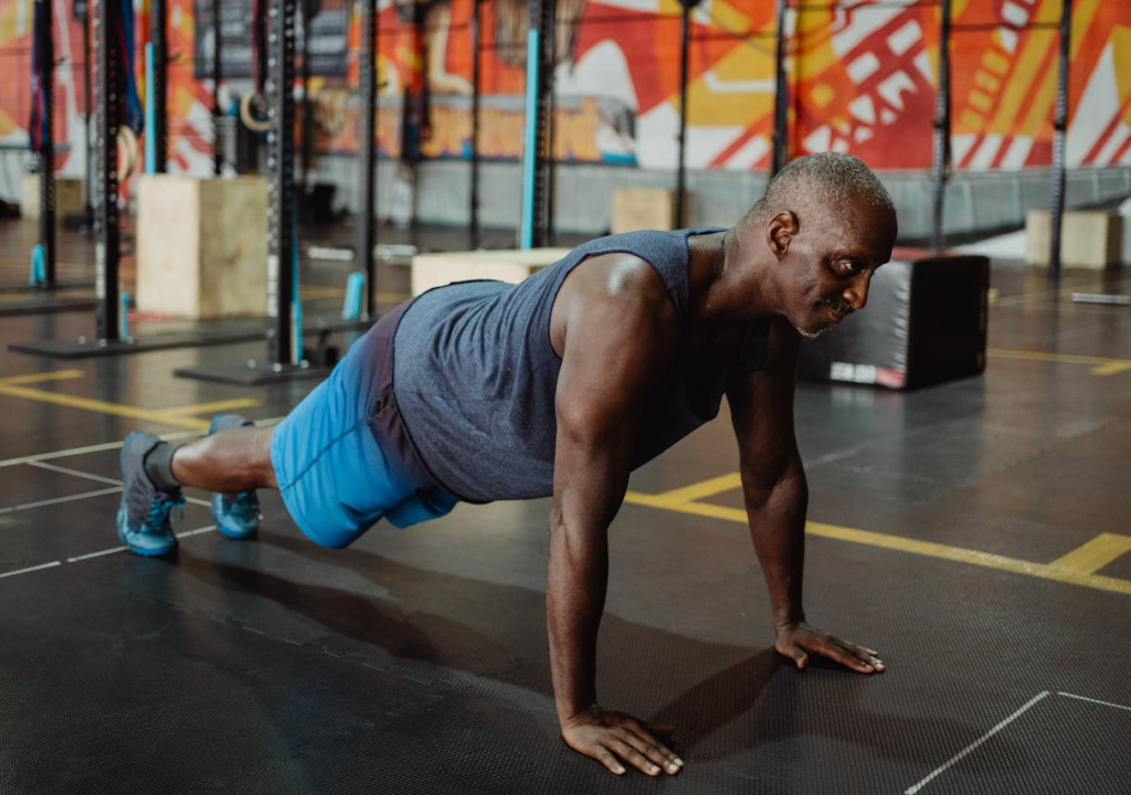 How to Master Different Push Ups: 7 Progressions for Strength and Fitness 2 man doing basic pushups in a gym