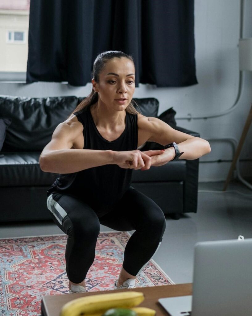 Unlock Strength and Longevity with These 5 Senior Fitness Workouts 2 an image of a woman demonstrating a high level of senior fitness workouts by performing a perfect air squat