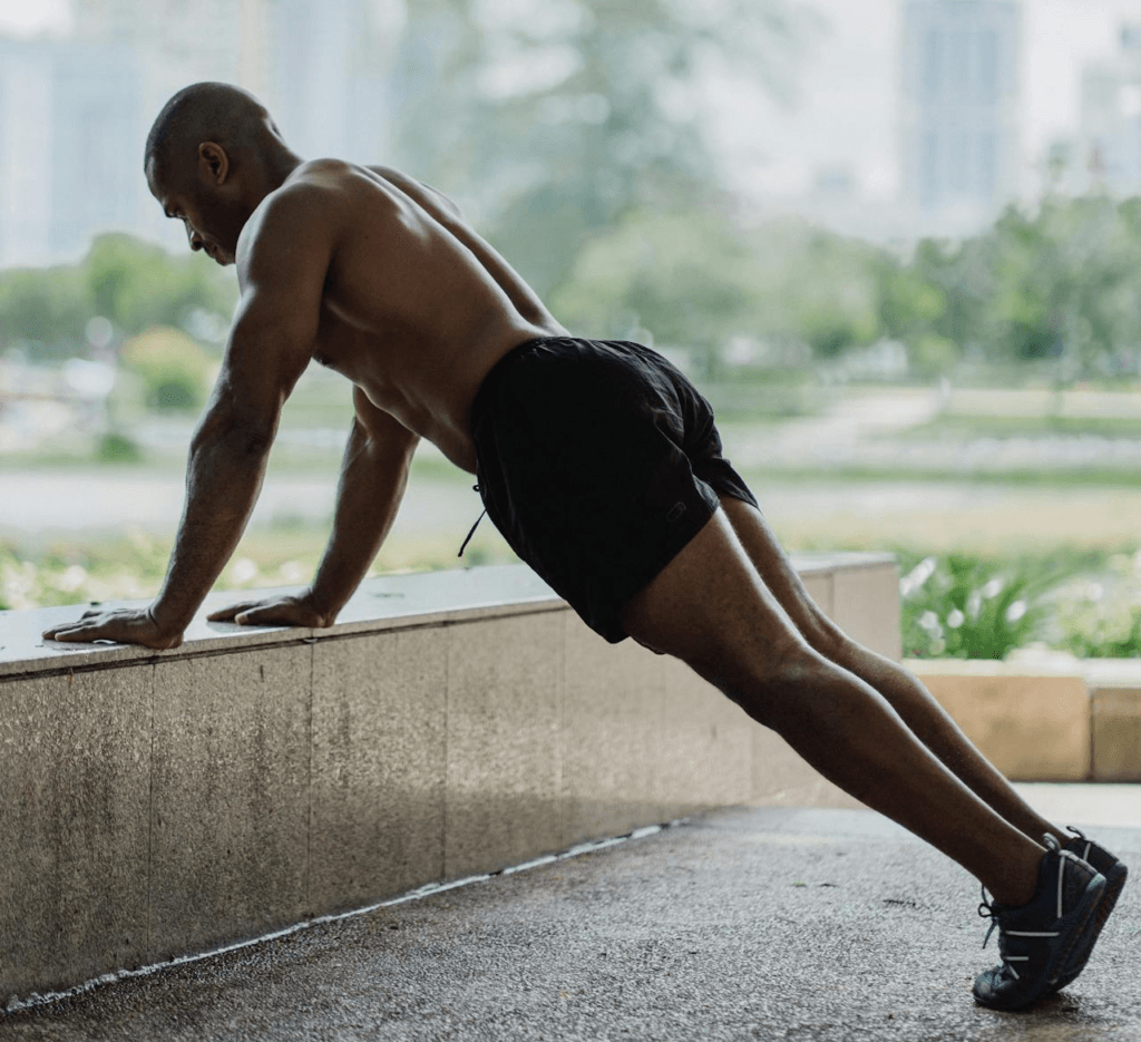 No Weight Workout: The Best Full-Body Routine and Gear to Take It to the Next Level 5 image of a man demonstrating a less challenging incline pushup.