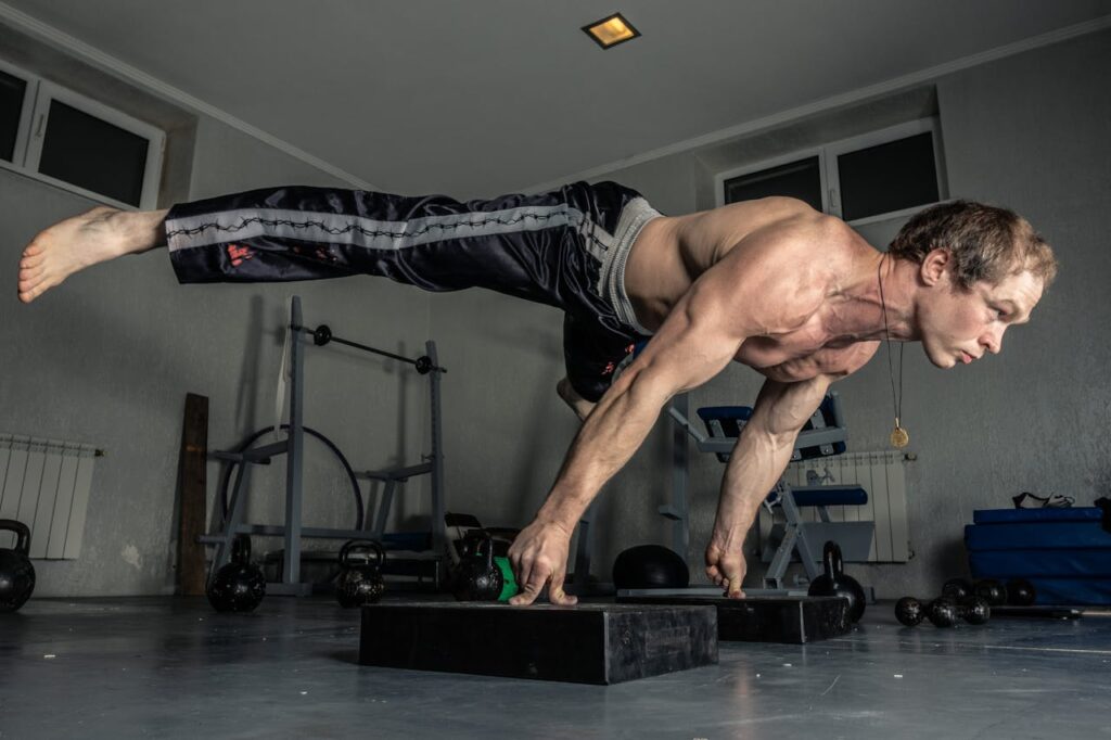 Full-Body Bodyweight Workout: A Dynamic 5 Step Plan 3 full-body bodyweight workout being demonstrated by a man doing an advanced planche pushups