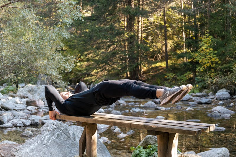 Full-Body Bodyweight Workout: A Dynamic 5 Step Plan 6 man doing an advanced dragon flag exercise for the core
