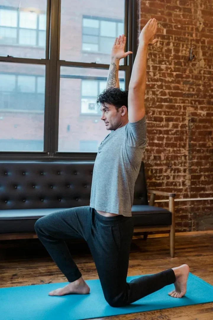 Bodyweight Exercises: 7 Incredible Workouts to Transform Your Fitness 7 man doing forward lunge at a city gym