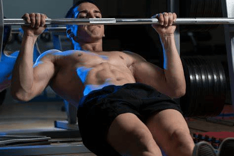 Unlock Calisthenics Strength: 3 Calisthenics Routines 5 image of man doing inverted rows under a bar