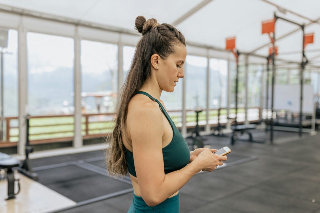 Micro Workouts: 7 Powerful Benefits for Fast Fitness Results 2 woman checking her timer before her next micro workouts
