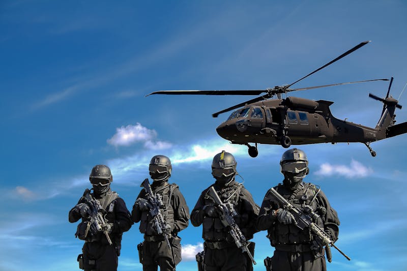 The Ultimate Calisthenics FAQ: Everything You Need to Know About Bodyweight Training 12 police in full equipment with helicopter in background