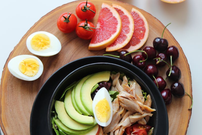 The Ultimate Calisthenics FAQ: Everything You Need to Know About Bodyweight Training 8 plate of healthy proteins, fats, and fruit