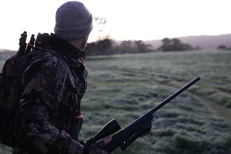 Functional Strength Through Calisthenics: Unlocking Your Full Potential 7 survivalist hunting in an open field