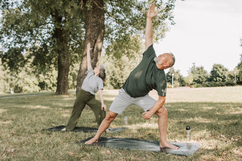 Strength Training for Seniors: 7 Powerful Ways to Stay Strong and Independent for Life 6 fit senior couple stretching in park